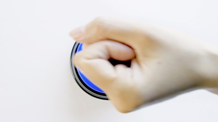 Pushing, hitting a big blue glossy fail button on white background. Woman pressing the fail meme button with finger, hand and fist. Concept of failing, bad luck, losing the game. Something went wrong.