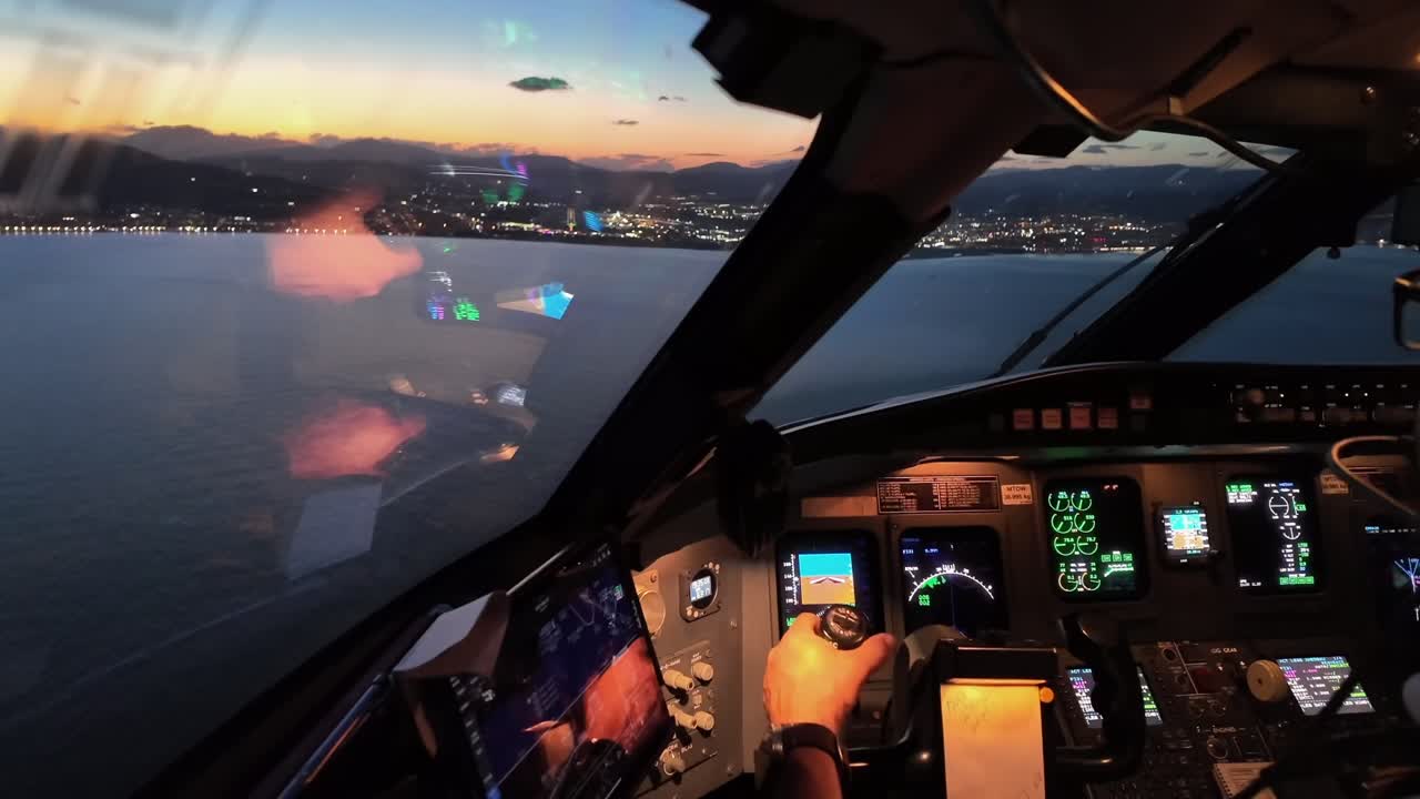 an immersive pilot’s perspective in a real time final approach to Malaga airport at dusk, as seen by the Captain through the windshield