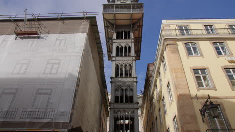 Looking-Up-At-Santa-Justa-Lift-At-Lisbon,-Portugal-During-Sunny-Day