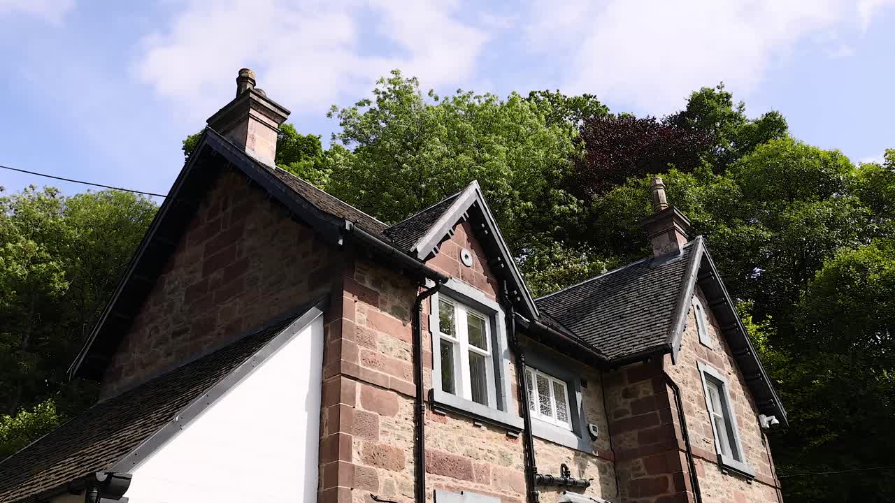 A charming house surrounded by lush greenery