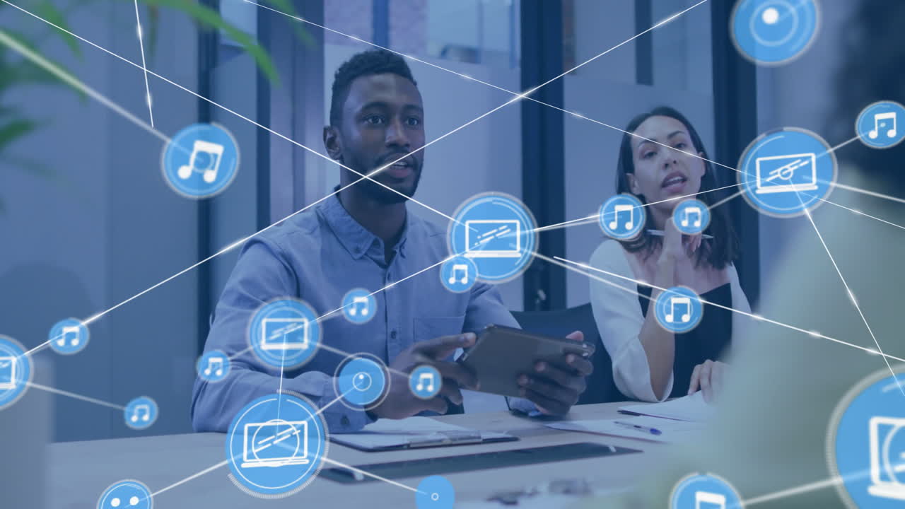 Animation of network of connections with device icons over diverse business people in office