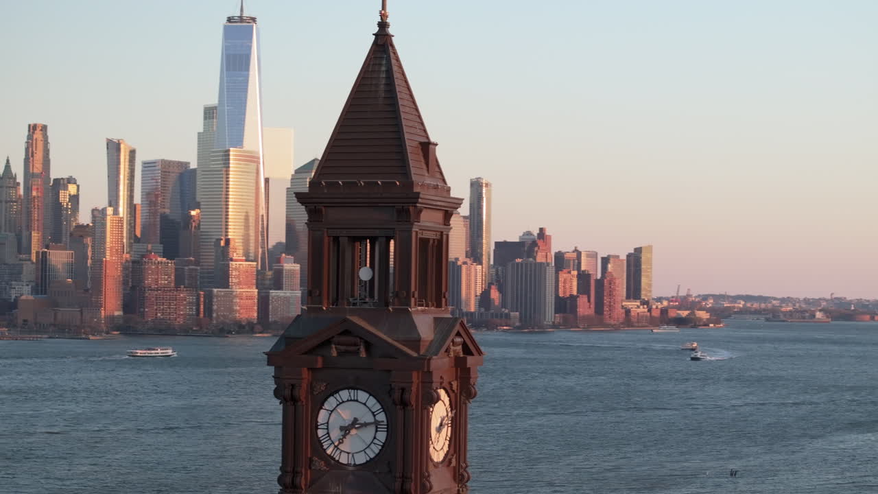 Aerial view of The World Trade Center and Hoboken Terminal. Shot at sunset along The Hudson River in New Jersey.