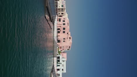 modern buildings along a scenic canal