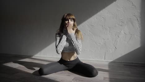 woman practicing yoga or dance poses