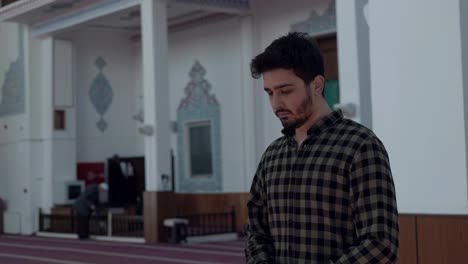 young man in mosque prays 6