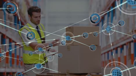 network of digital icons over caucasian male supervisor with clipboard checking stock at warehouse