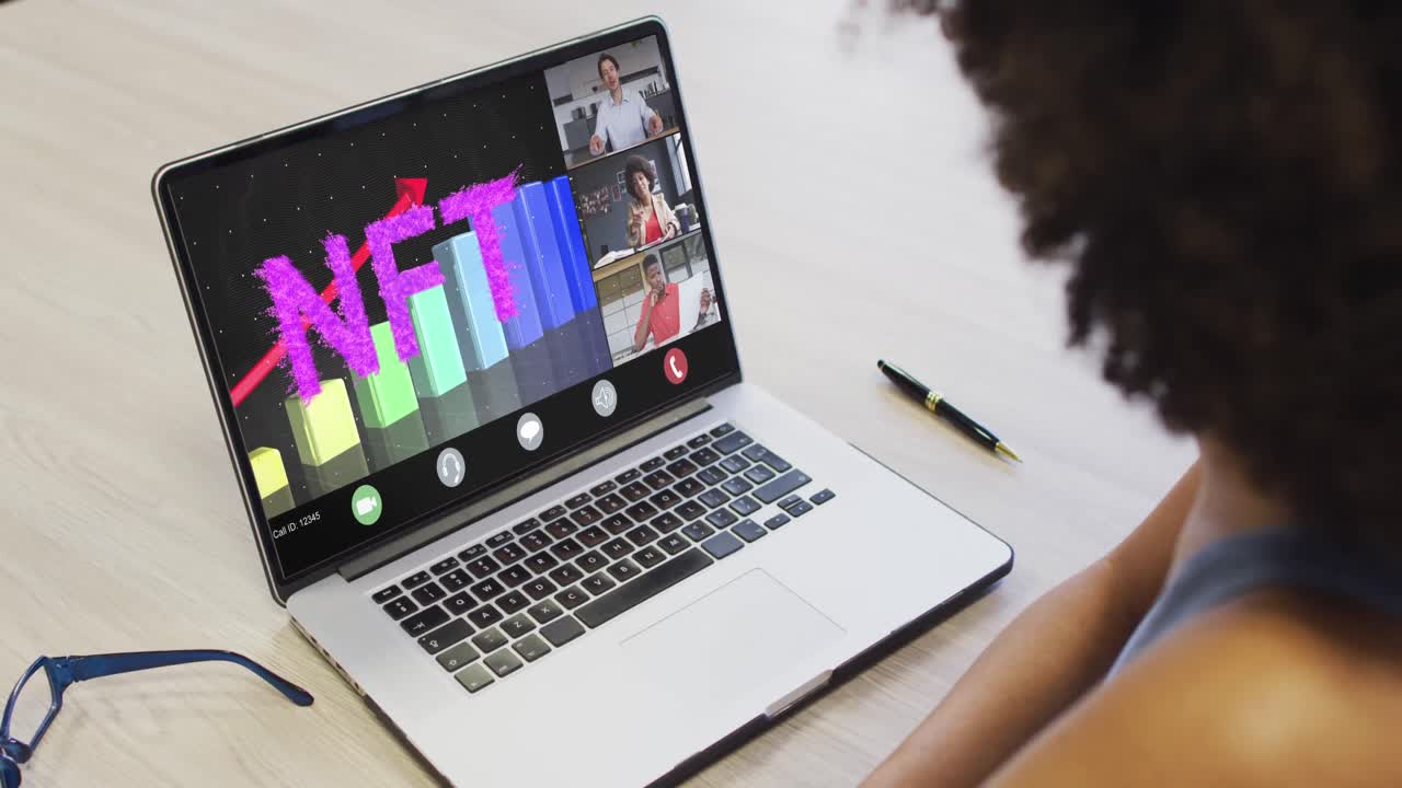 African american businesswoman using laptop for video call with diverse business colleagues