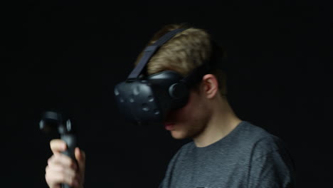 man wearing virtual reality headset in studio shot on r3d