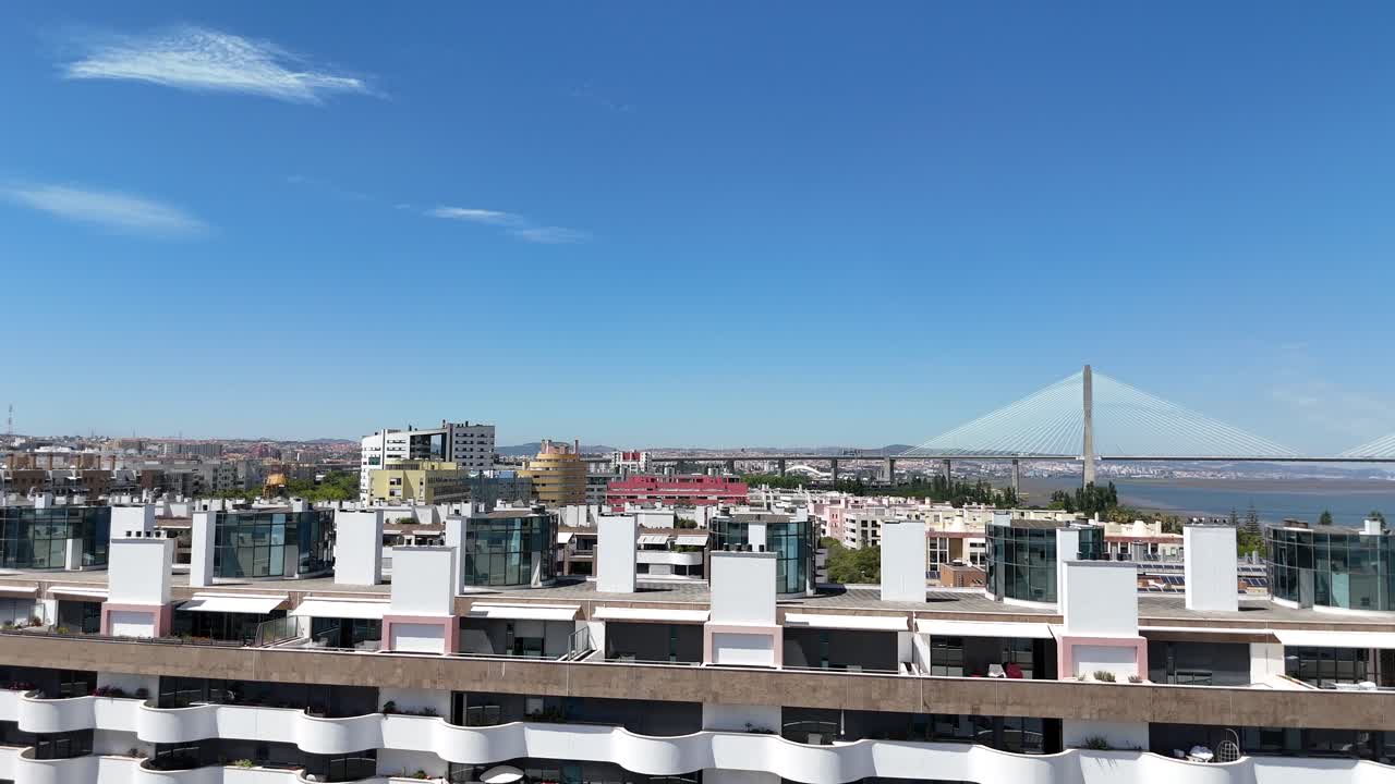 Cityscape view featuring modern architecture and a bridge