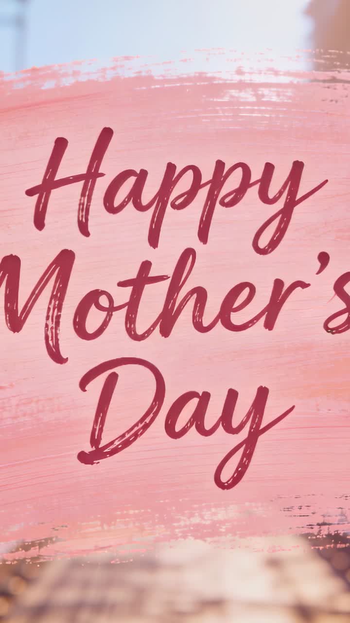 Vertical video: Looping card showing Mother's Day message on phone screen, using pink brush for mom