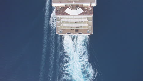 A-breathtaking-top-down-aerial-view-of-a-cruise-liner-navigating-the-serene-waters-of-the-Mediterranean-Sea-near-Cyprus