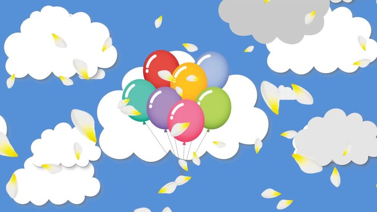 Petali bianchi che si muovono contro un grappolo di palloncini nel cielo blu