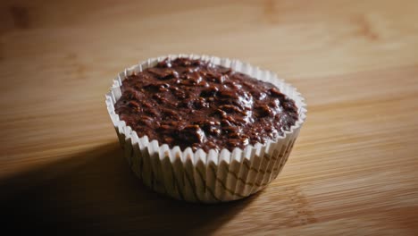 Nutritious-Choco-Oat-Cake-On-Wooden-Board-In-The-Kitchen