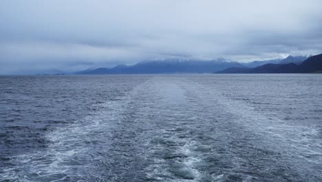 Antarctica Cruise Ship Leaving Port from Ushuaia in the Beagle Channel on the Way to Antarctic Holiday Vacation, Setting Sail from Ushuaia Harbour, the Harbor Port in Argentina in the Beagle Channel