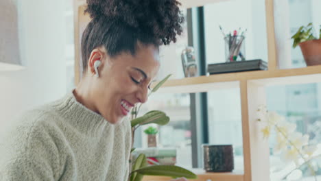 online in living room, black woman playing game