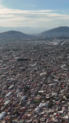 portrait-oriented aerial shot of northern ecatepec, mexico