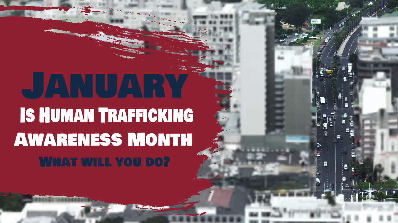 Animation of human trafficking text over cityscape
