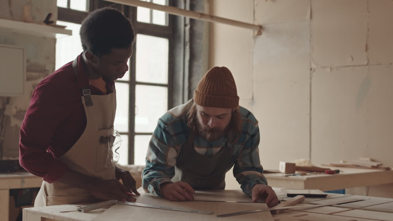 African American Man on Carpentry Courses in Workshop