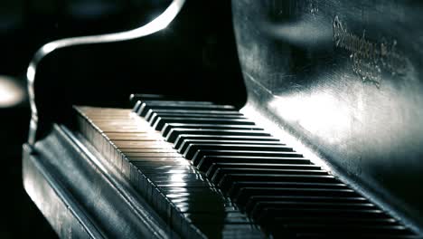 male hand opening the cover of an old piano. close-up. 4k resolution.