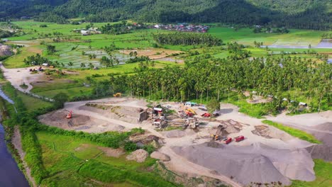 aerial view of the truck vehicles at the quarry plant at the rural area in the philippines