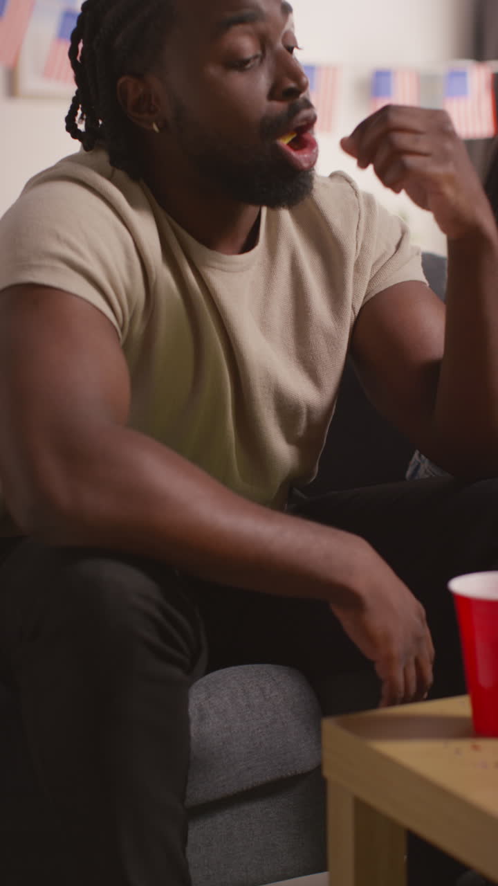 Vertical Video Of Friends Drinking Beer And Eating Snacks At Party Celebrating American Independence Day 4th July