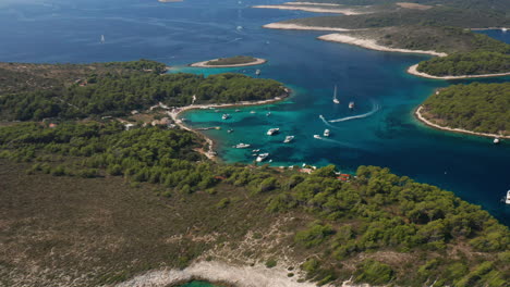 Flying-Towards-Mooring-Boats-In-Paklinski-Otoci-Islands-In-The-Adriatic-Sea-Near-Hvar,-Croatia