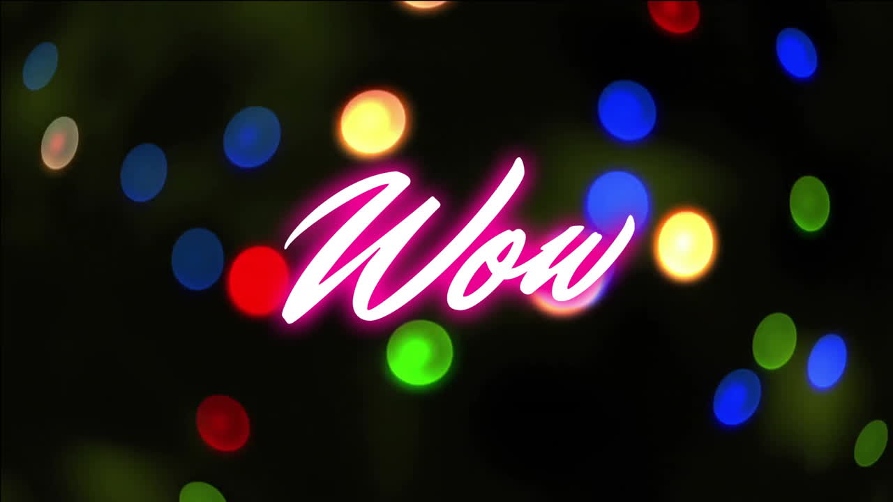 검은 바탕에 다채로운 빛의 반점 위에 분홍색 와우 텍스트의 애니메이션