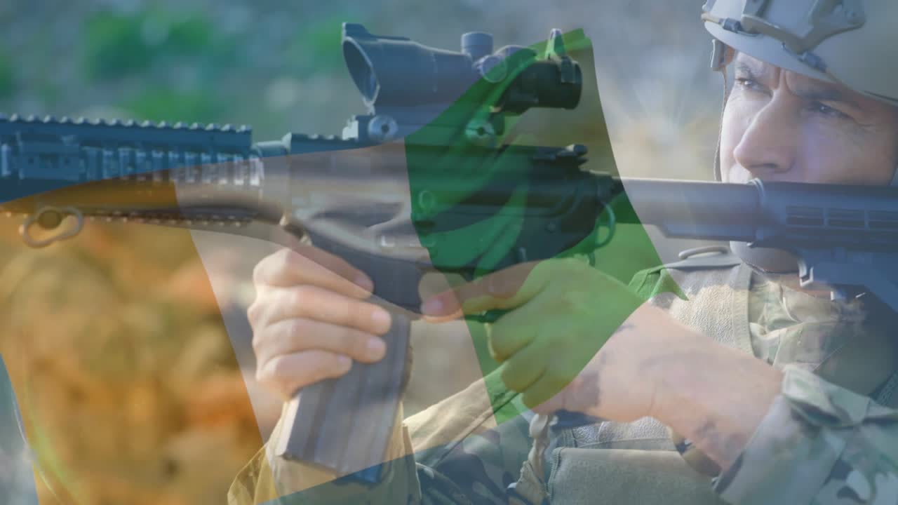 Soldier seating mag, racking bolt and shouldering rifle to aim, triangular overlay partly obscuring