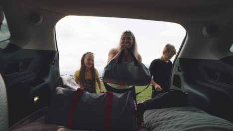 family road trip packing the car