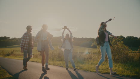 tourists spending leisure time near meadow during vacation