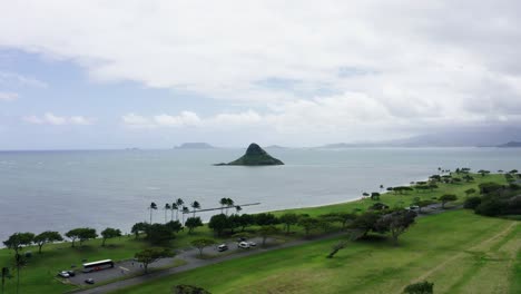 Drone-shot-of-Oahu's-Kualoa-Regional-Park-on-a-cloudy-day