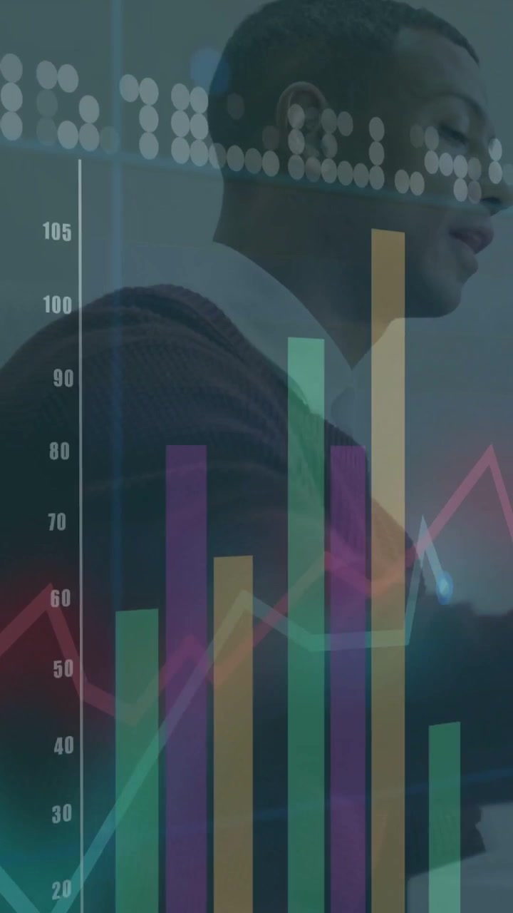 Vertical video: Animating stacked bars, causing man leaning and studying data in office in sweater