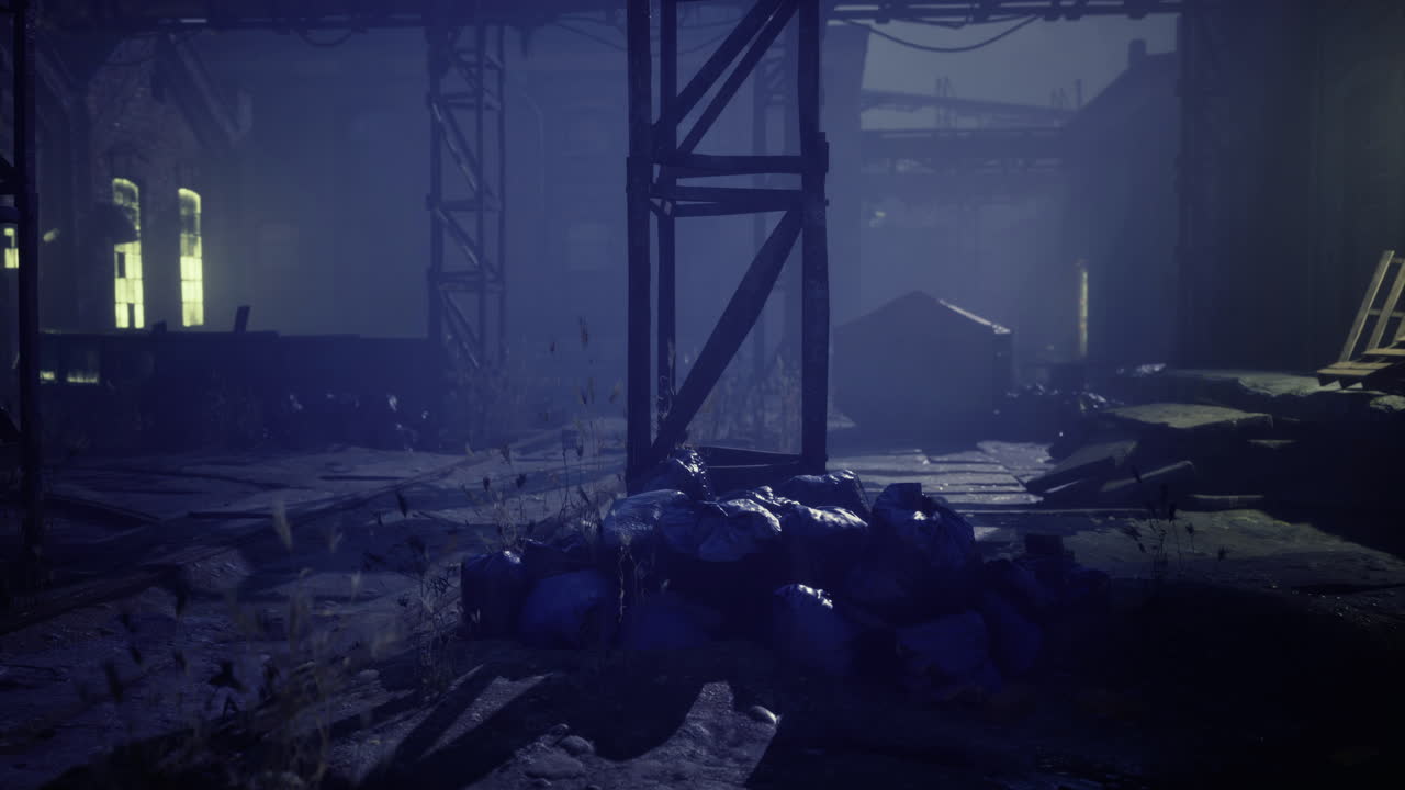 Abandoned warehouse interior with remnants of activity and shadows