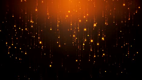 las partículas de oro que caen parpadean y brillan contra un fondo negro. fondo abstracto para el glamour de la moda y la riqueza la prosperidad el lujo