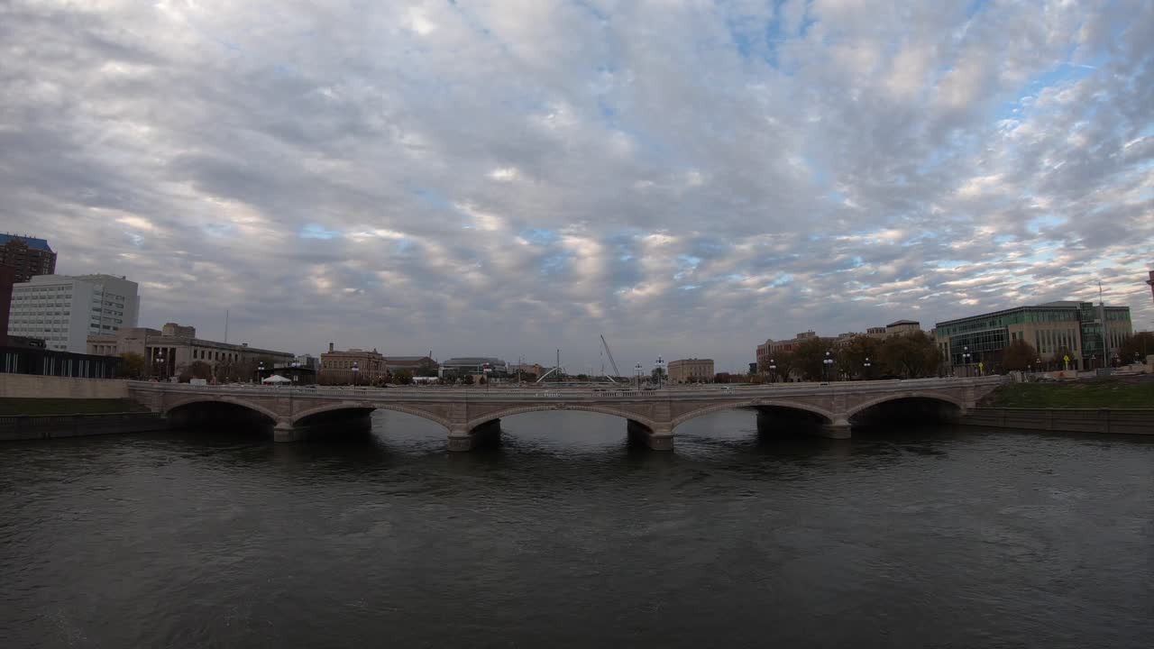 Time lapse of a river front bridge