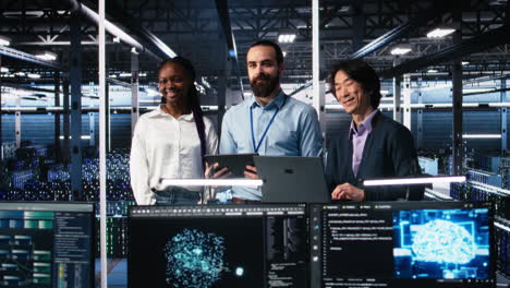 happy data center colleagues collaborating on software development