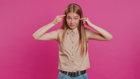 Displeased-woman-pointing-at-camera-show-stupid-idiot-gesture-finger-near-head-dumb-insane-plan-idea