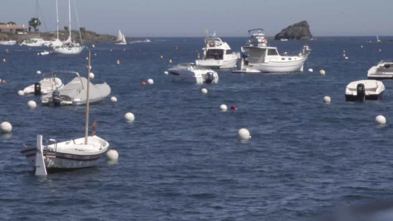 Time Lapse boats in the ocean, clear sky, summer, Costa Brava, Spain, static shot