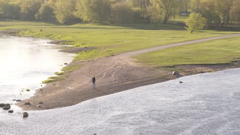 Drone-aerial-view-of-Confluence-park-in-Kaunas,-Lithuania