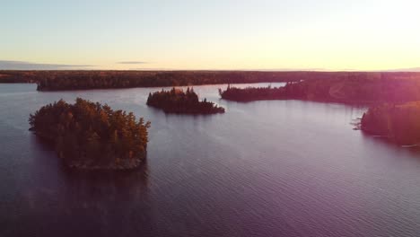 Sunrise-over-surreal,-calm-lake