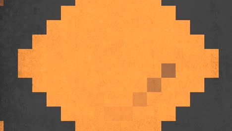 cuadrado pixelado con centro naranja rodeado de cuadrados blancos y negros