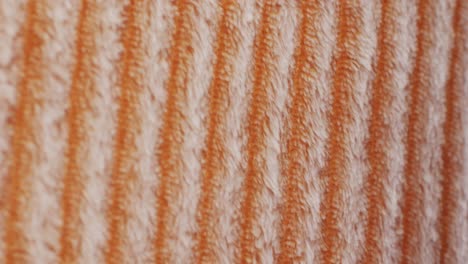 detailed orange and white striped textured fabric, ideal for textiles and patterns. perfect for apparel and crafts
