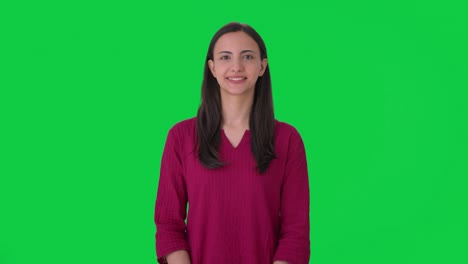 Happy-Indian-woman-looking-at-the-camera-Green-screen
