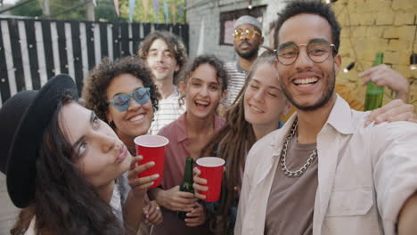 group selfie at a backyard party