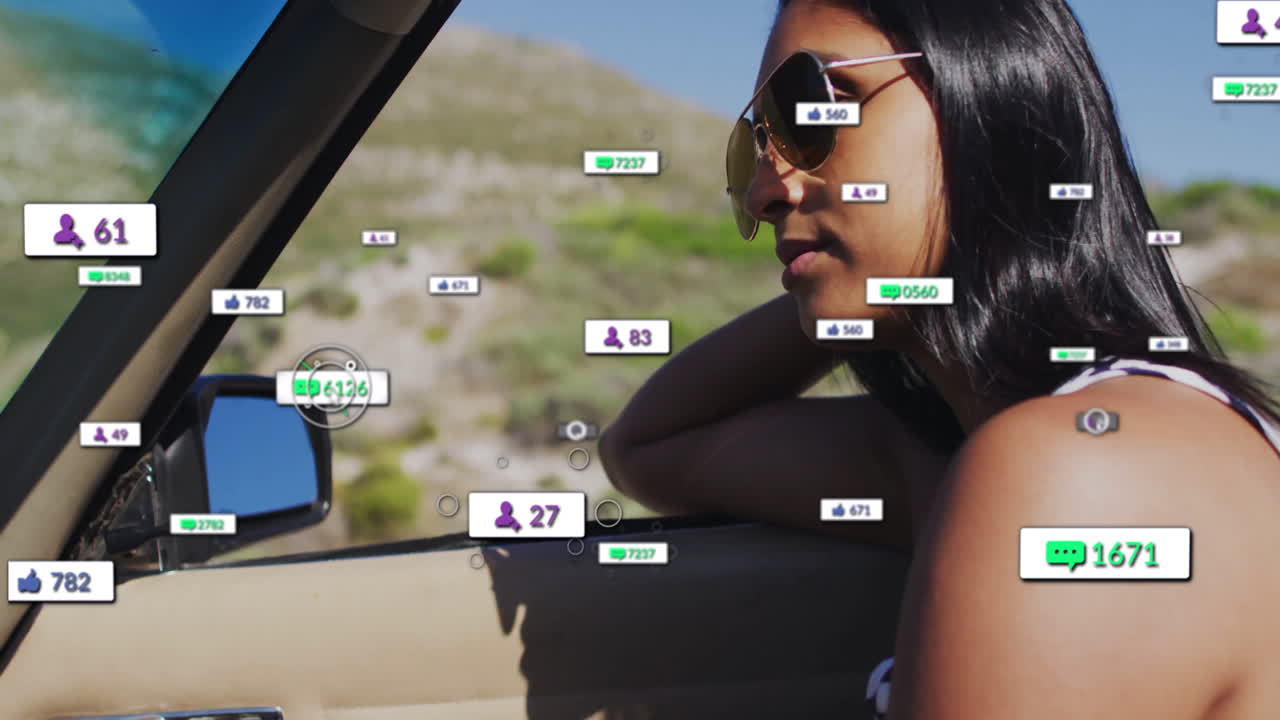 Woman leaning on convertible door wearing aviator shades showing floating marketing icons on road