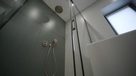 modern tiled bathroom with shower in modern home, real estate interior. wide shot footage