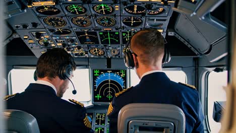 pilots in cockpit