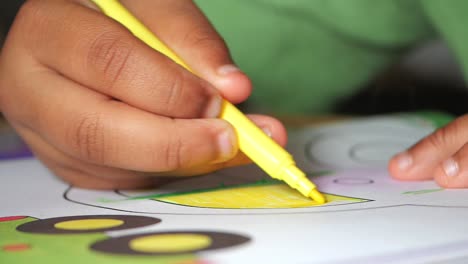 child coloring a picture