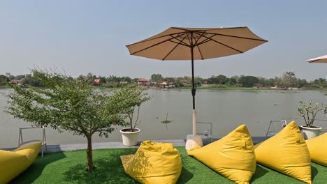 peaceful outdoor setting with bean bags and umbrellas