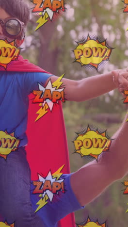 animación de iconos de cómics sobre feliz padre caucásico con hijo con trajes de superhéroe